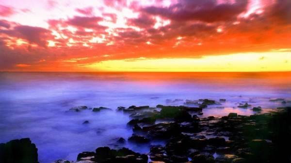 海邊日落唯美圖片 碧海藍天風景宜人