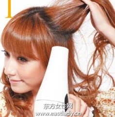 通過倒吹與拉散提升發(fā)型飽滿效果