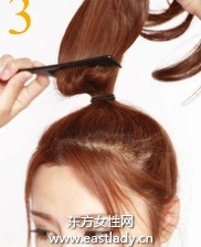 立體圓潤高盤發(fā)造型展現清爽臉部輪廓