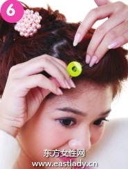 柔媚動人盤發(fā)發(fā)型設計