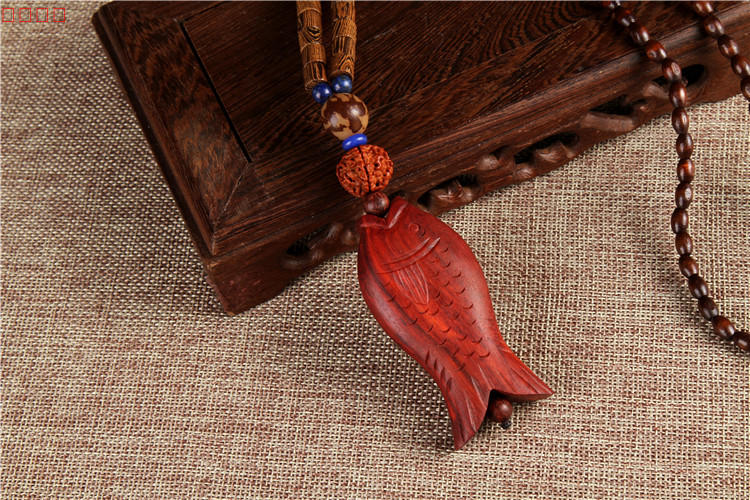古樸典雅的木魚(yú)吊墜項(xiàng)鏈