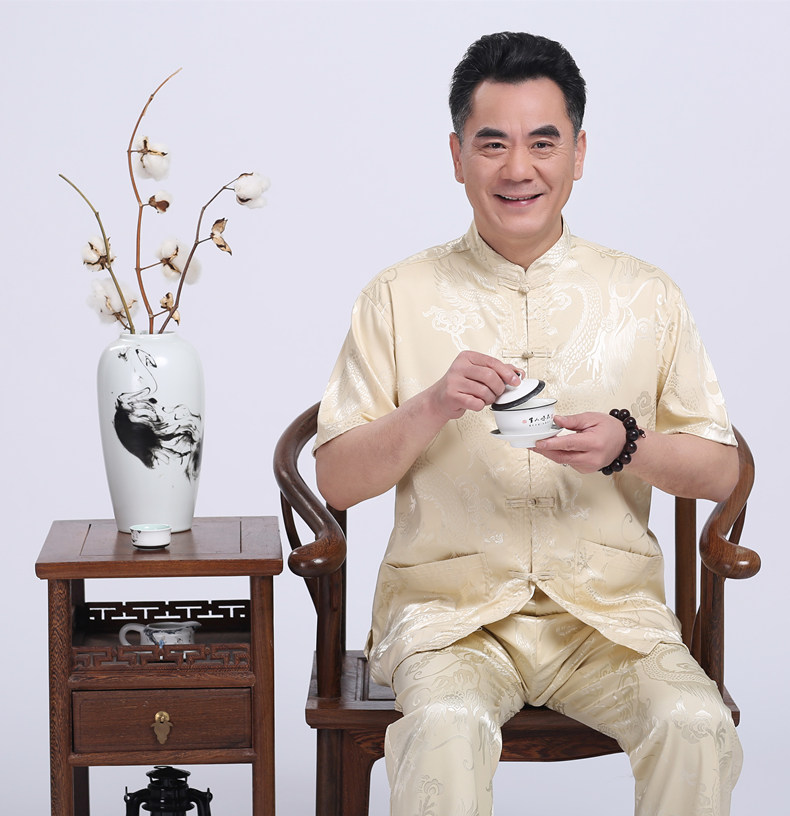 米黃色匠心啟航閱讀繡龍?zhí)籽b男士唐裝