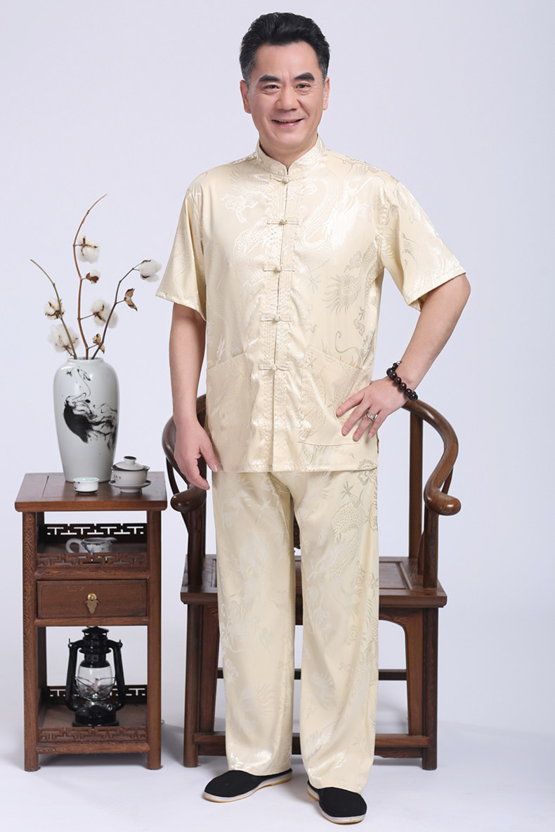 米黃色匠心啟航閱讀繡龍?zhí)籽b男士唐裝