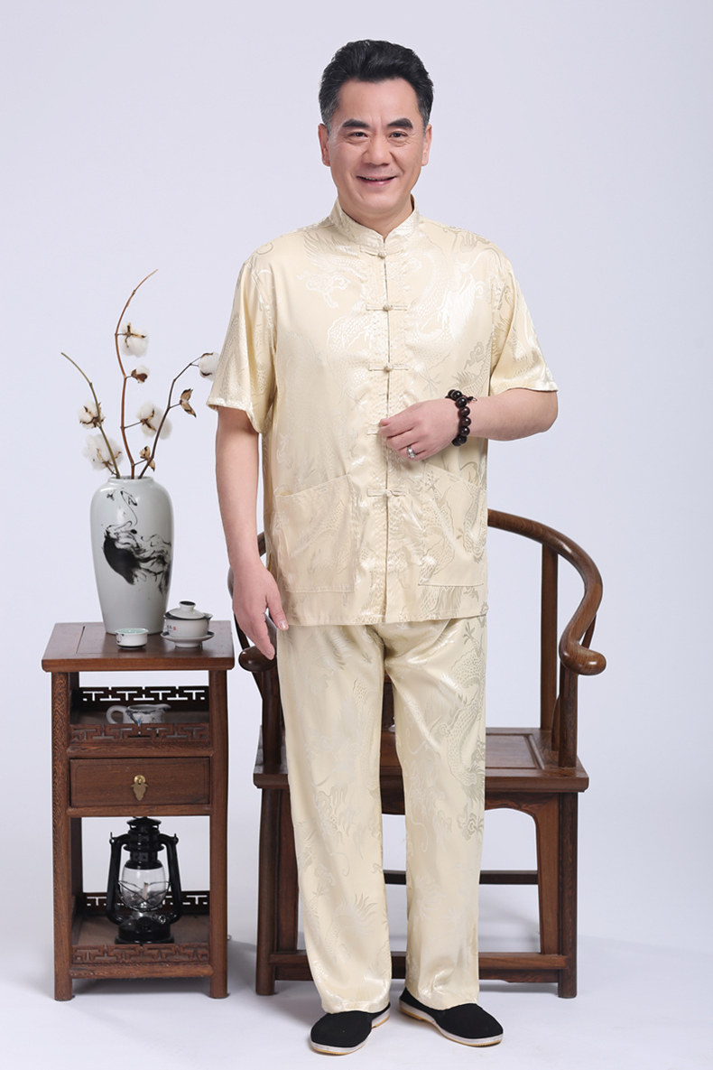 米黃色匠心啟航閱讀繡龍?zhí)籽b男士唐裝