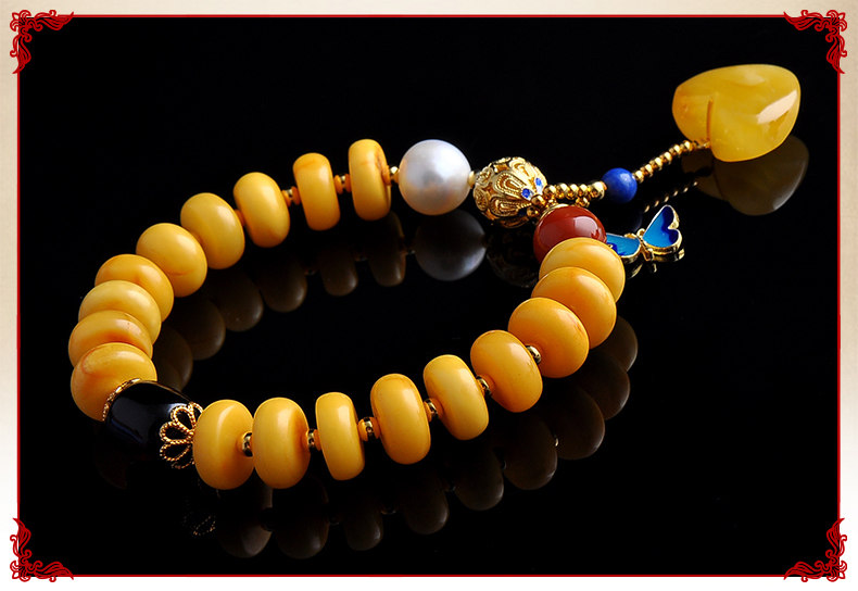 復(fù)古時尚心形吊墜蜜蠟手串