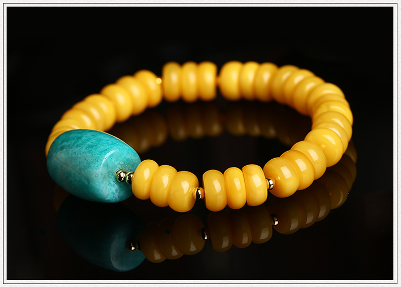 簡(jiǎn)約復(fù)古天河石桶珠蜜蠟手串