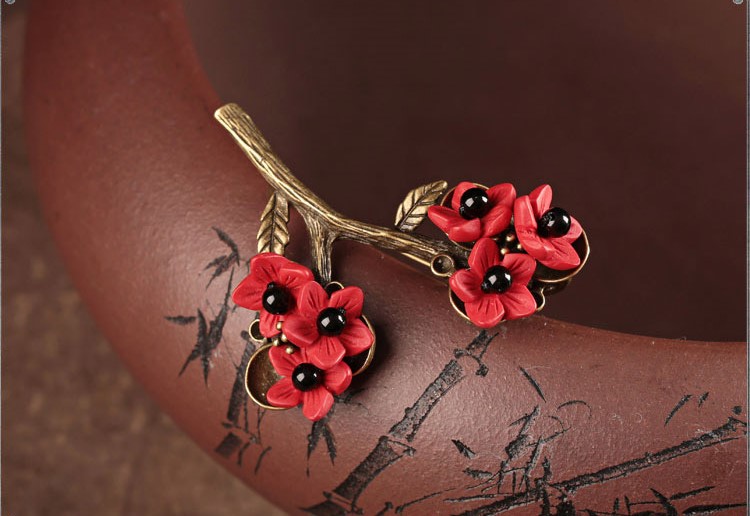 匠心啟航閱讀紅色梅花花朵飾品