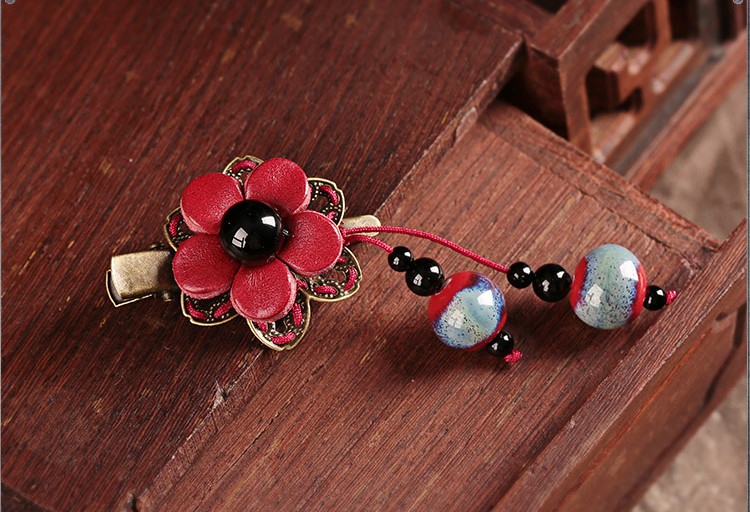 匠心啟航閱讀紅色花朵古風(fēng)發(fā)夾頭飾