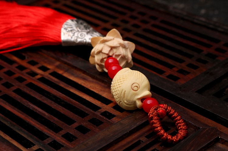 匠心啟航閱讀流蘇木雕，年年有余細膩木雕