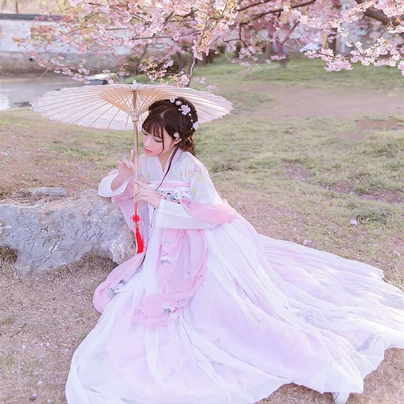 傳統(tǒng)華夏粉色漢服，漢元素清新淡雅漢服圖片