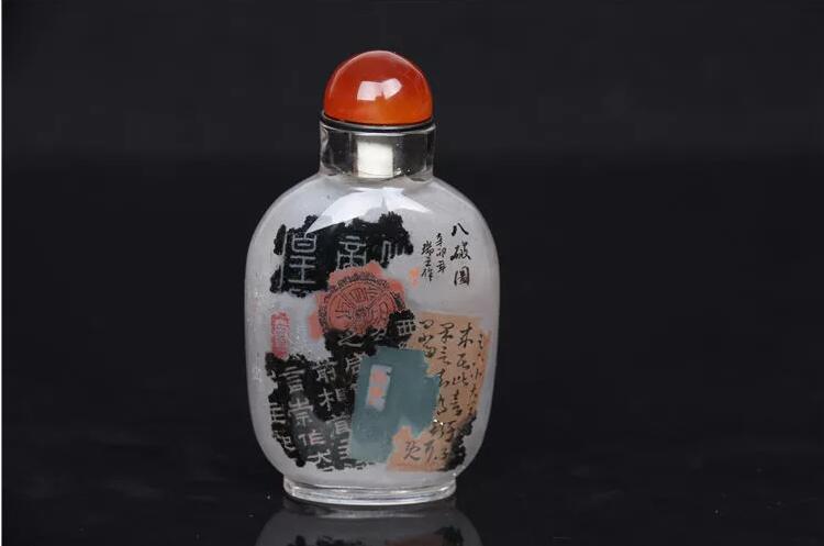 天然水晶內畫鼻煙壺：八破圖錦灰堆