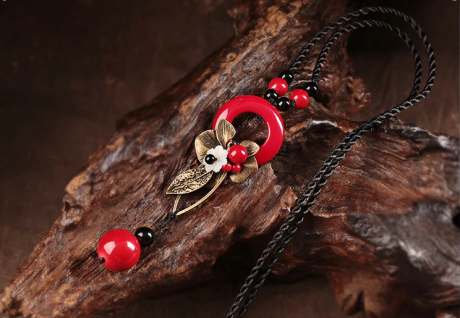 紅艷復(fù)古的毛衣鏈時尚項(xiàng)鏈?zhǔn)罪? / data-5POh=